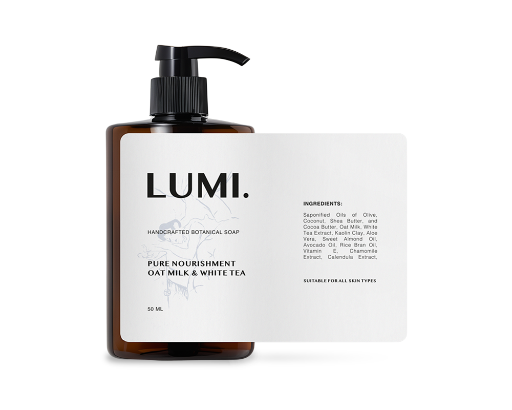 A brown pump bottle of Lumi botanical soap with a label showing ingredients and text: "Pure Nourishment Oat Milk & White Tea, 50 ml."